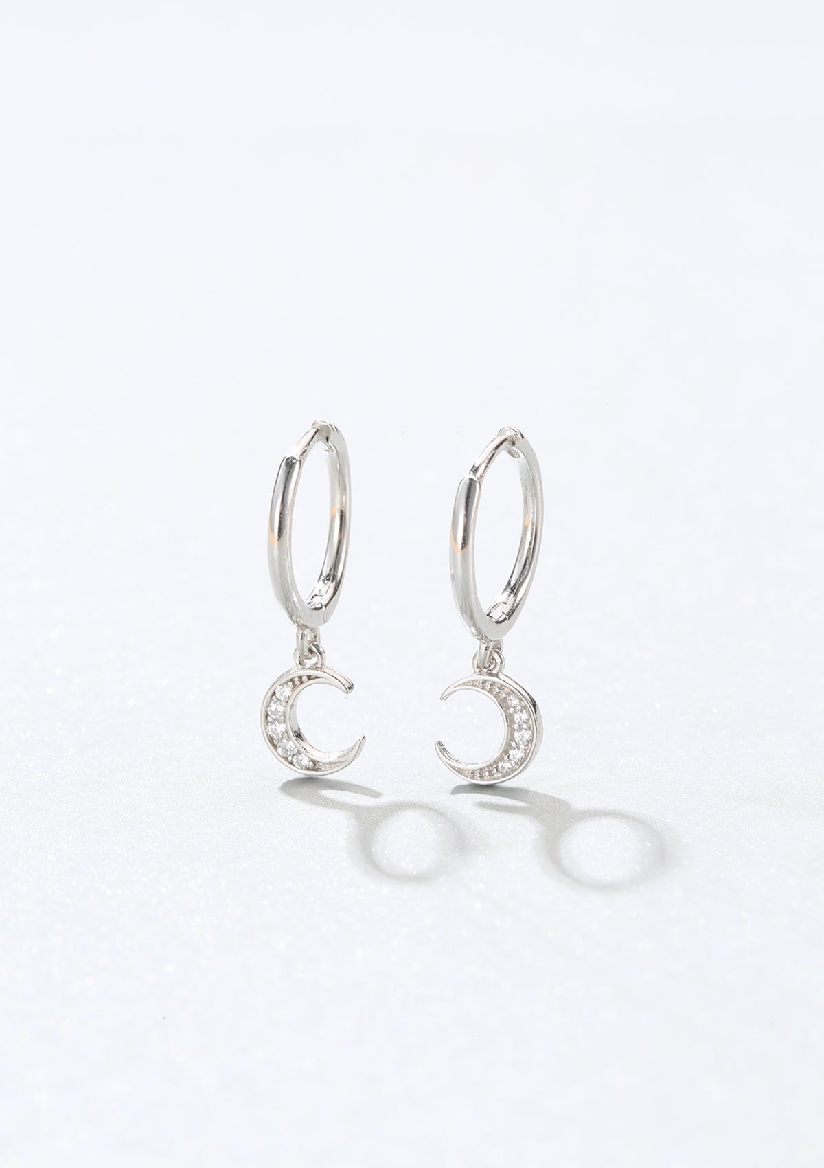 Crescent Moon Huggie Earrings Sterling Silver